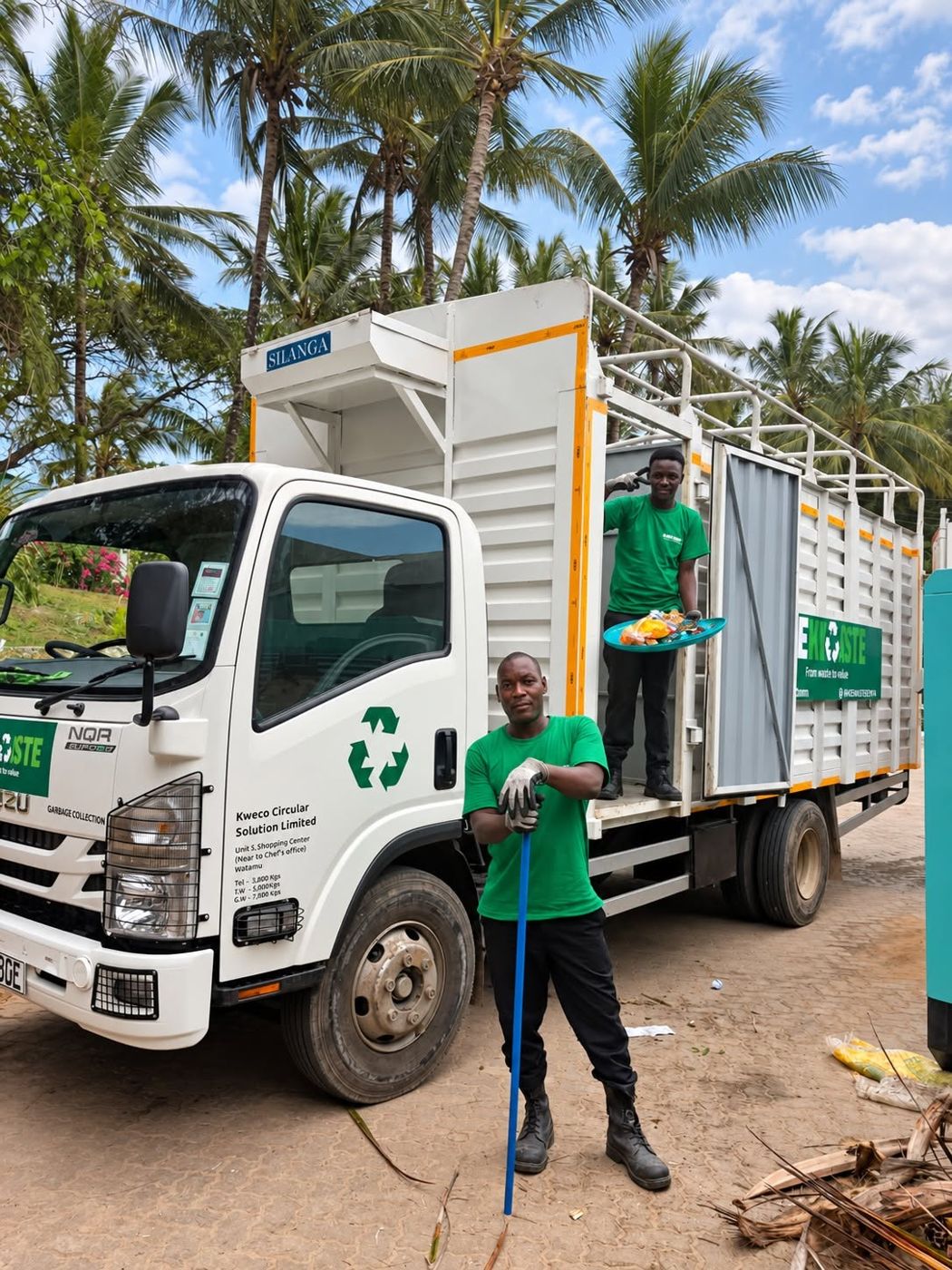 KEWASTE crew with their branded Isuzu truck under the palms in Watamu