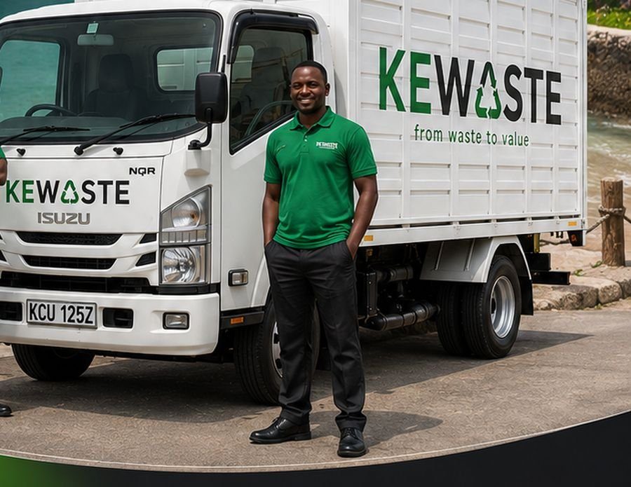 A KEWASTE crew member next to a branded Isuzu truck